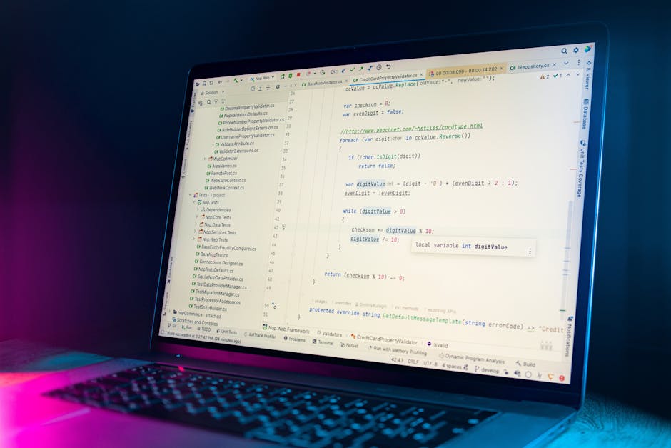 A close-up photograph of a computer monitor displaying a web development code editor with HTML and CSS code. The screen shows typical web page elements such as the doctype declaration, HTML tag with l